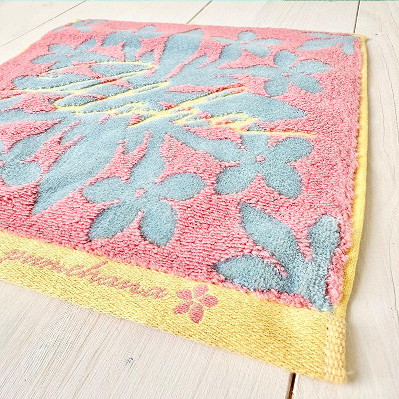 ピンクのジャガード織はんかち