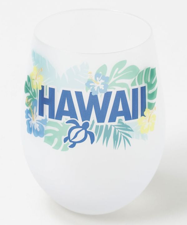 HAWAIIロゴとハイビスカス、ホヌが描かれたハワイアンデザインのグラス