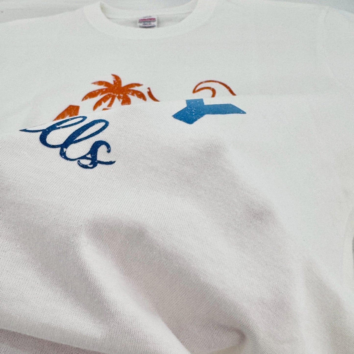 ハワイアンデザインTシャツ RAIBOW MESSAGE
