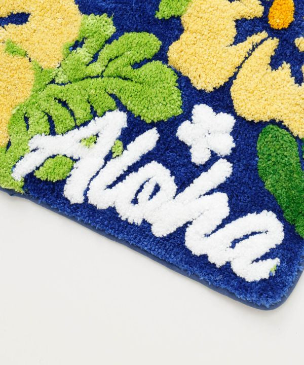 ブルーカラーのハイビスカスとAlohaロゴが描かれたハワイアンパイルマット